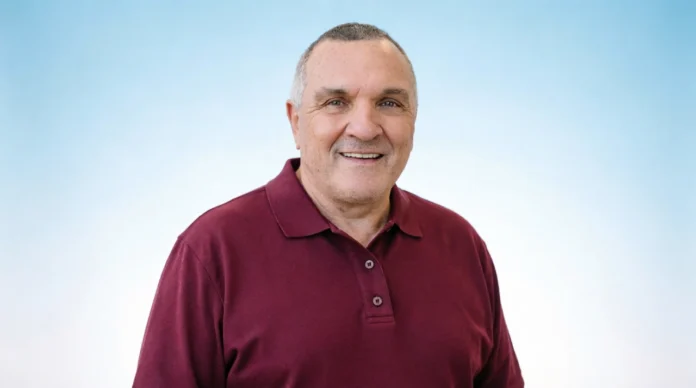 Rudy Ruettiger net worth 2026 featured image showing motivational speaker and Notre Dame football player